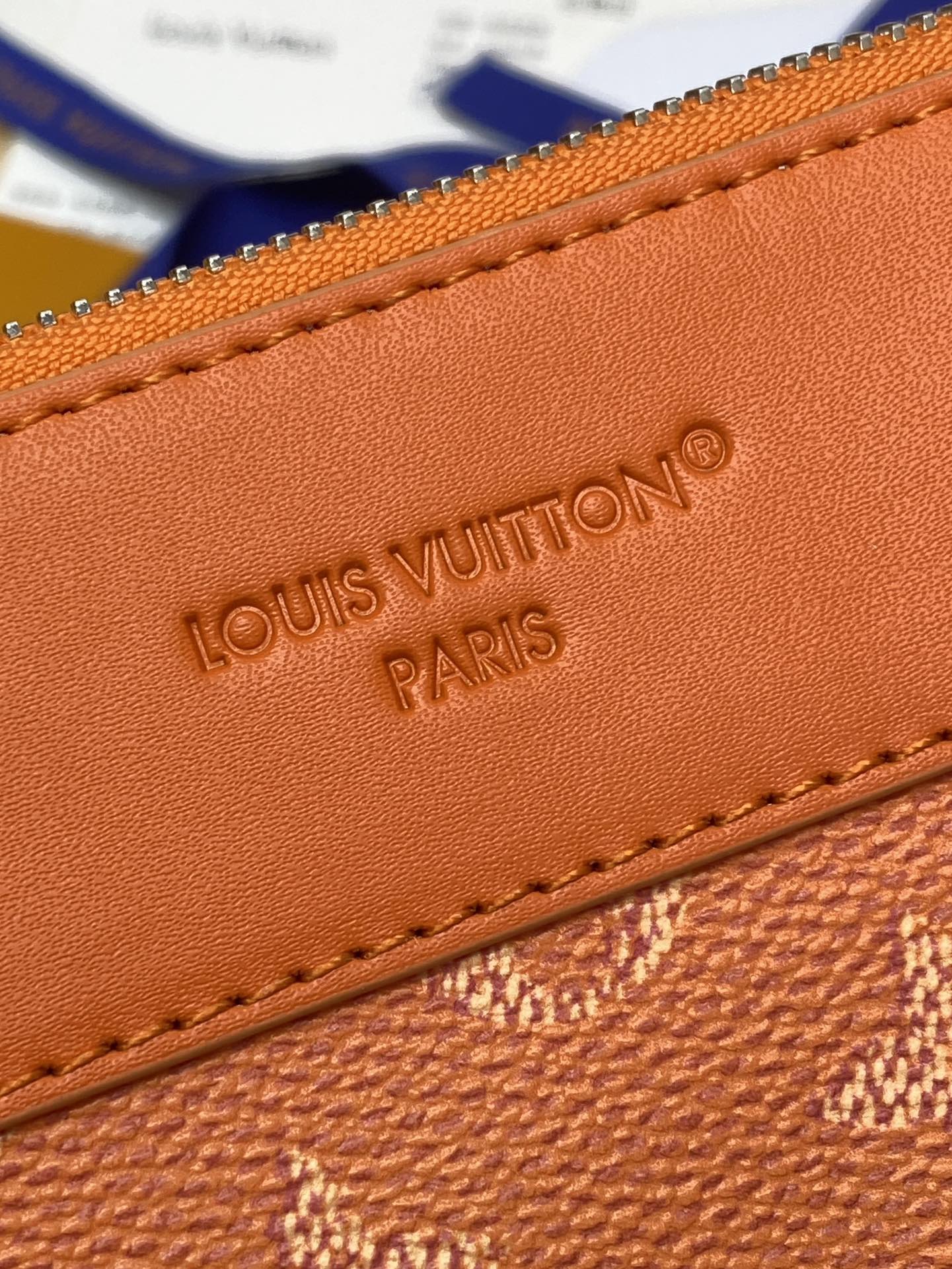 LV高仿橘色Monogram手拿包時尚亮眼造型設計｜歐美奢侈品精品推薦