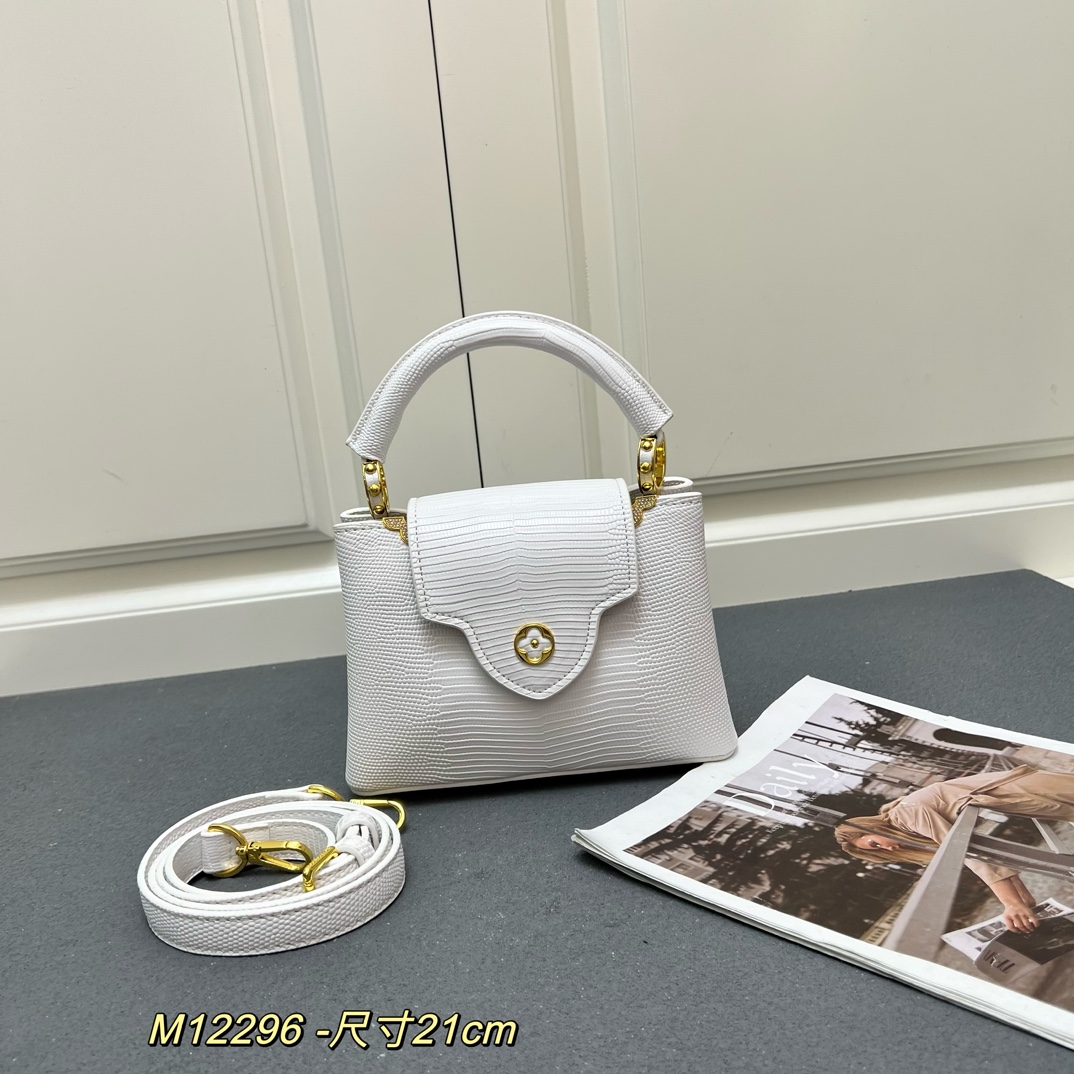 LV精品仿製Capucines Mini白色蜥蜴壓紋手提包21cm典雅百搭款|超A仿原單精品圖片 14 LV精品仿製Capucines Mini白色蜥蜴壓紋手提包21cm典雅百搭款|歐美奢侈品精品推薦