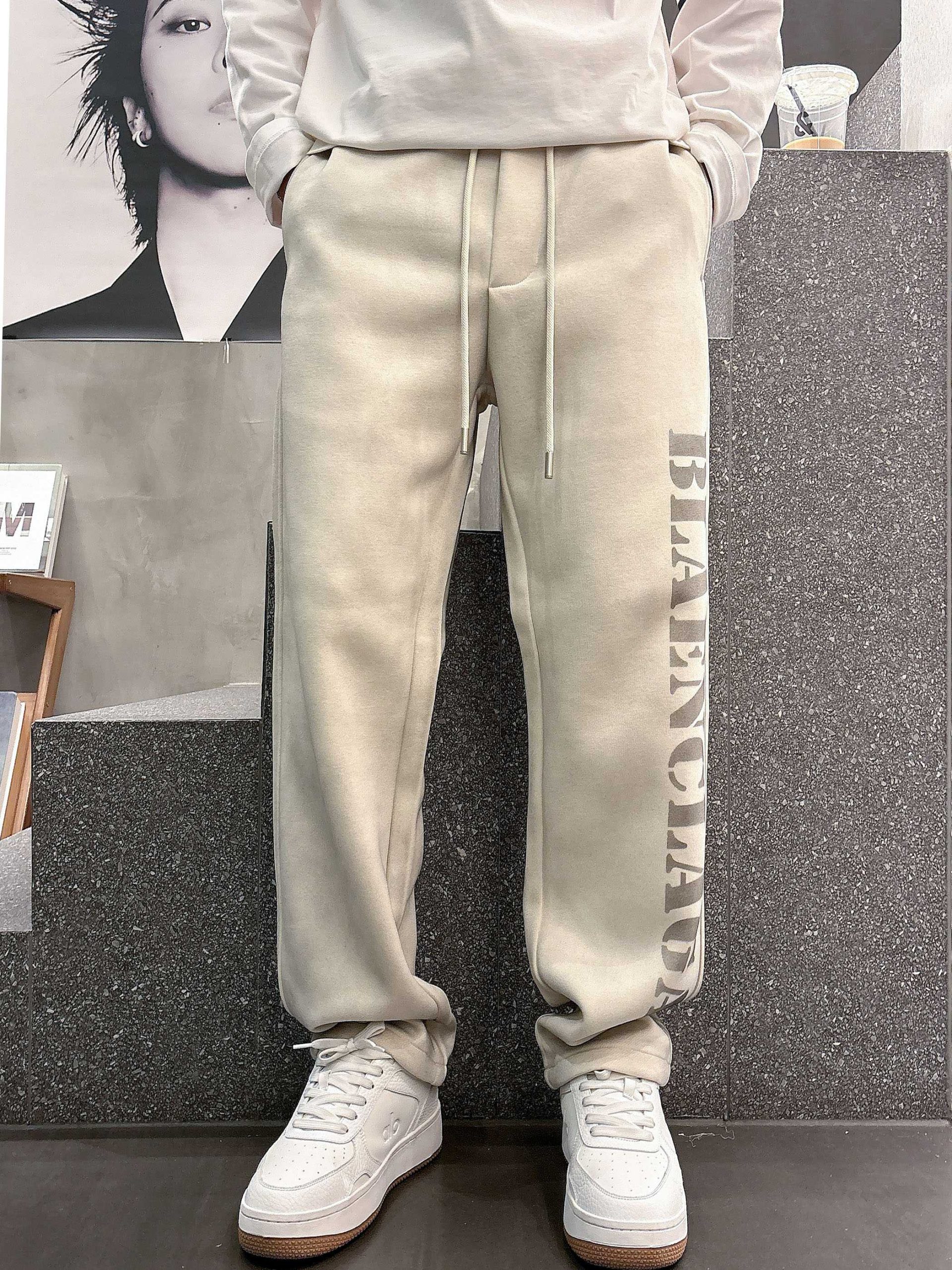 Balenciaga 高仿運動長褲男款 奶油白大LOGO寬版褲型| 14 Balenciaga 高仿運動長褲男款 奶油白大LOGO寬版褲型
