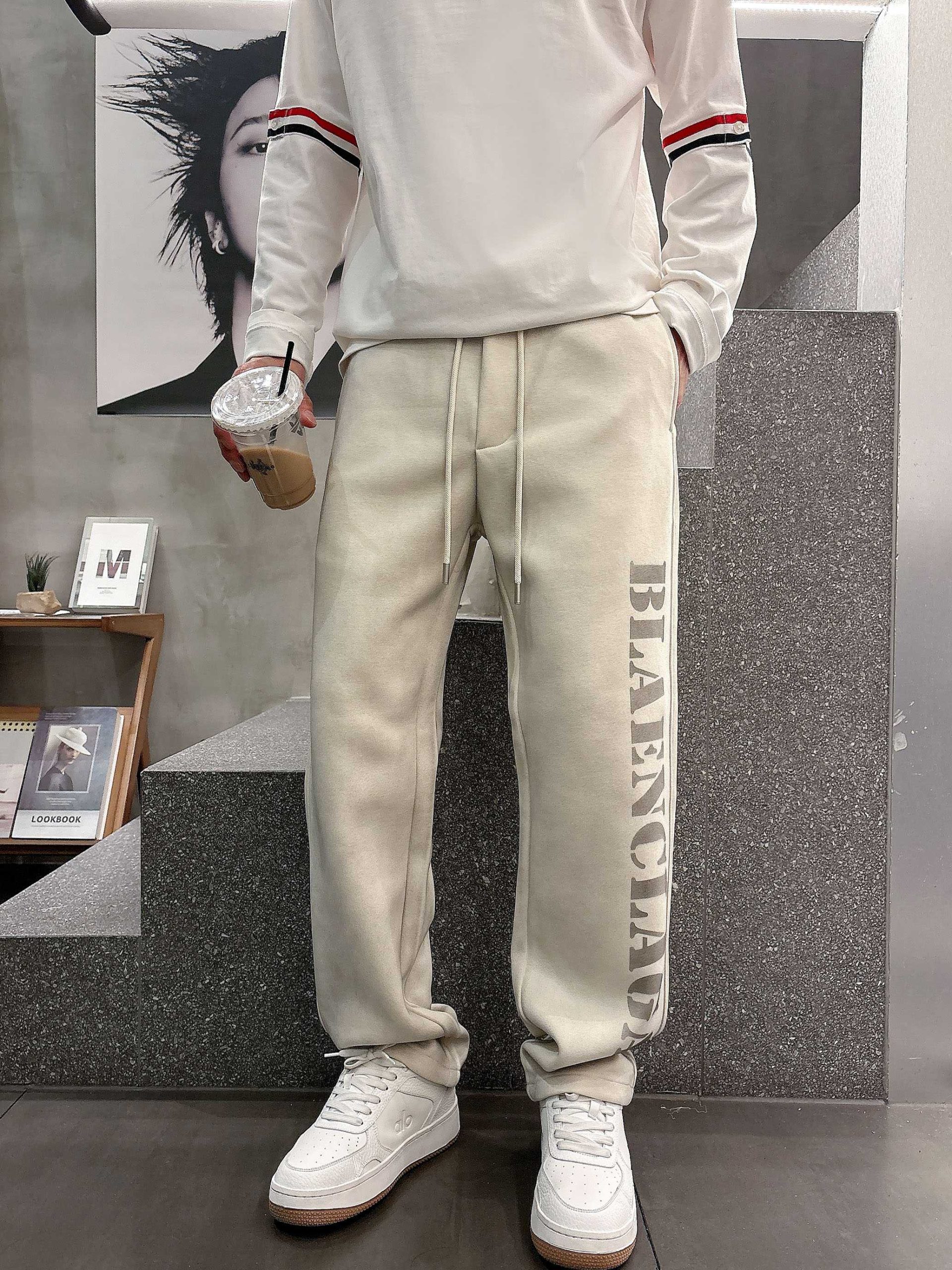 Balenciaga 高仿運動長褲男款 奶油白大LOGO寬版褲型| 13 Balenciaga 高仿運動長褲男款 奶油白大LOGO寬版褲型