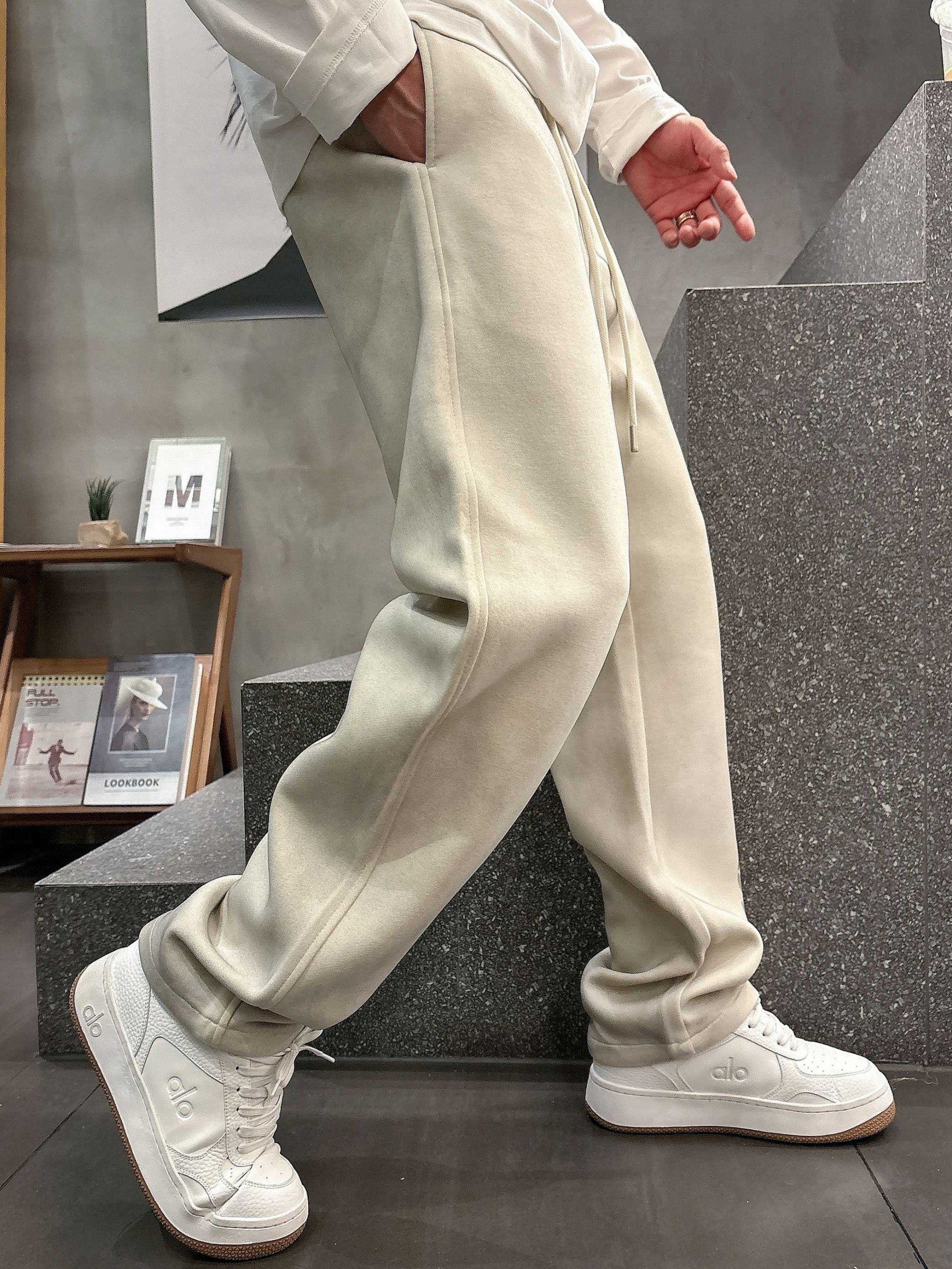 Balenciaga 高仿運動長褲男款 奶油白大LOGO寬版褲型| 10 Balenciaga 高仿運動長褲男款 奶油白大LOGO寬版褲型