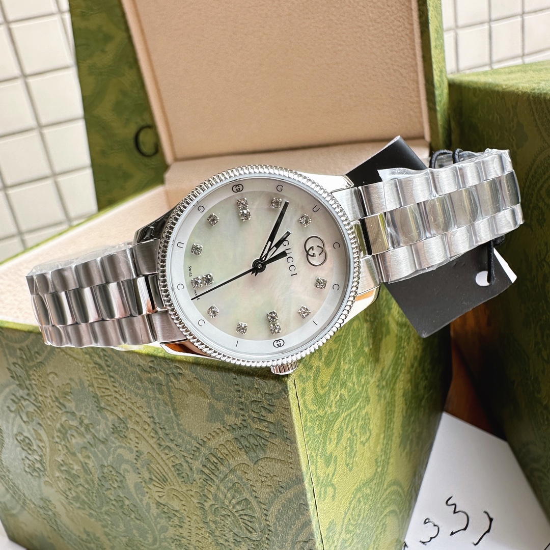 Gucci高仿女錶Timeless系列鋼帶款氣質珍珠白面腕錶