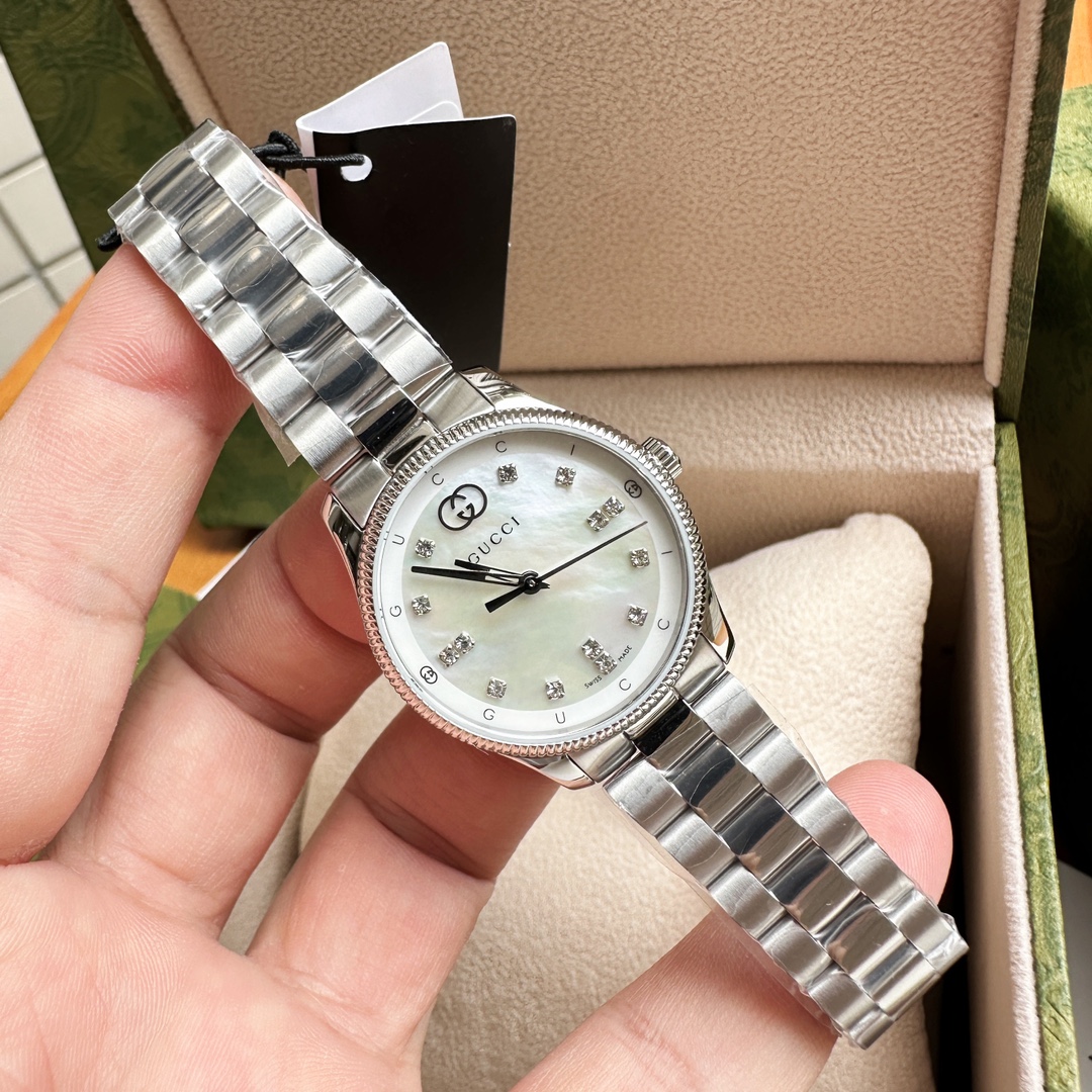 Gucci高仿女錶Timeless系列鋼帶款氣質珍珠白面腕錶
