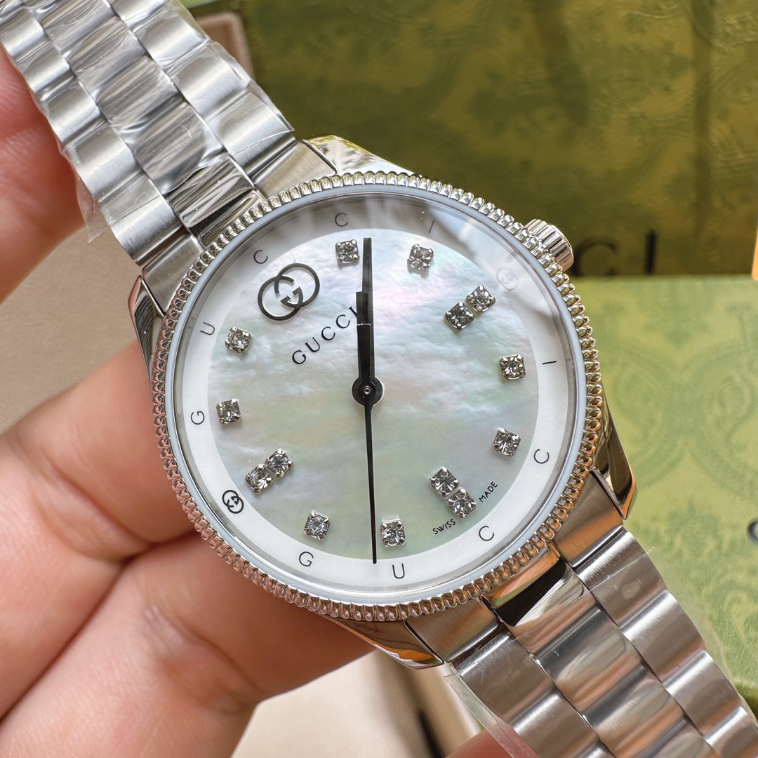 Gucci高仿女錶Timeless系列鋼帶款氣質珍珠白面腕錶