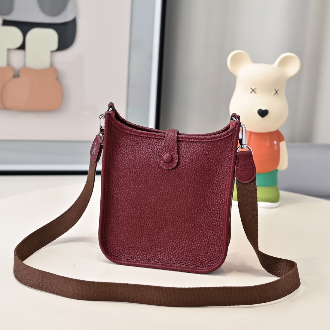 Hermes 高仿 Evelyne Mini 斜挎包 酒红色 H镂空经典款| 13 Hermes 高仿 Evelyne Mini 斜挎包 酒红色 H镂空经典款
