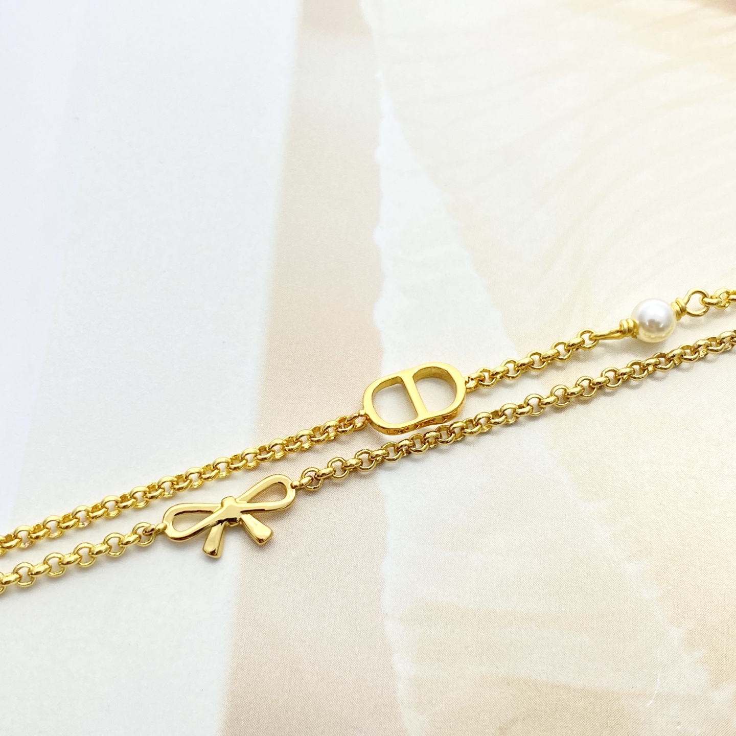 Dior高仿CD蝴蝶結雙層手鍊輕奢氣質女款飾品| 13 Dior高仿CD蝴蝶結雙層手鍊輕奢氣質女款飾品