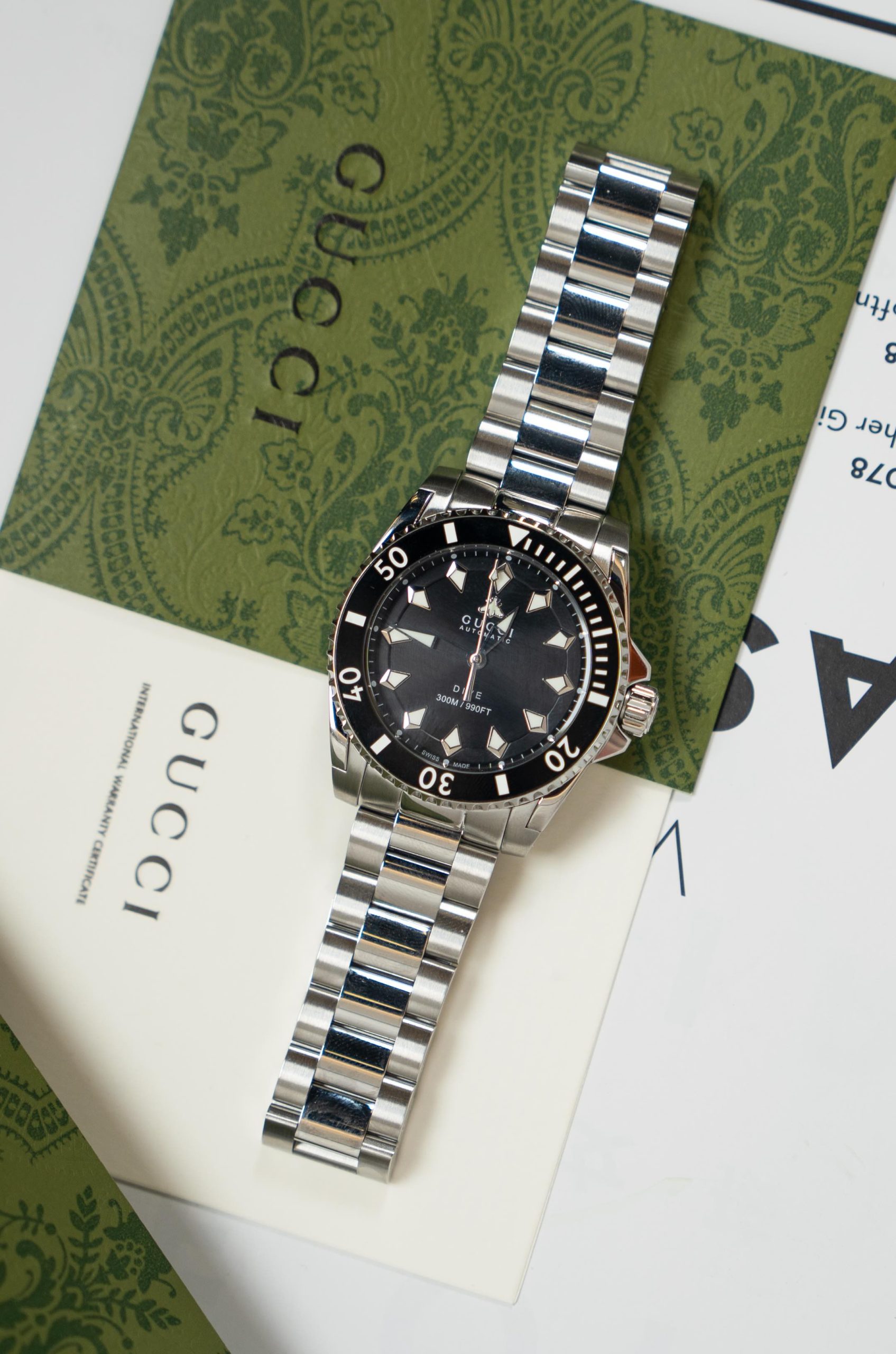 Gucci Dive 黑色表盤精鋼潛水腕錶 男士機械運動款| 12 Gucci Dive 黑色表盤精鋼潛水腕錶 男士機械運動款